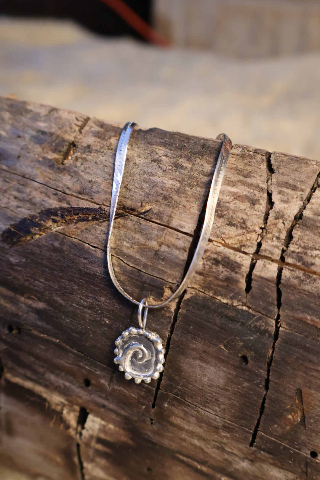 Spiral charm necklace