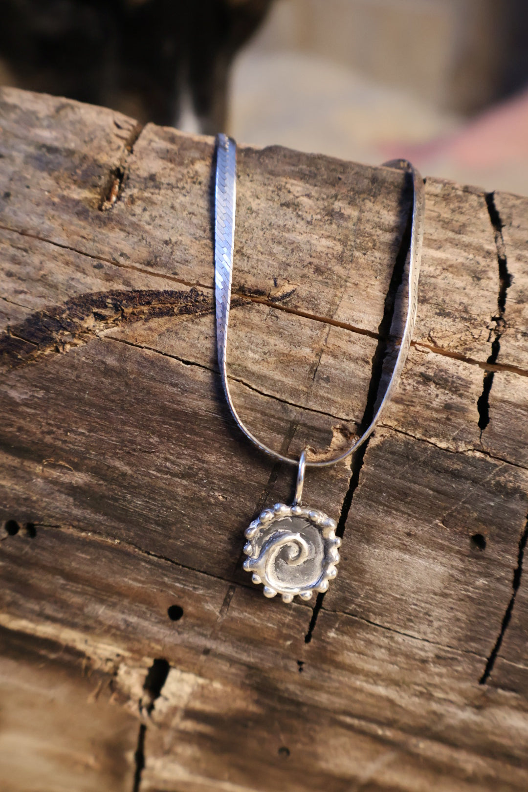 Spiral charm necklace