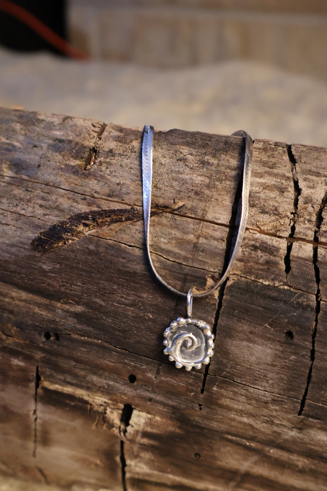 Spiral charm necklace